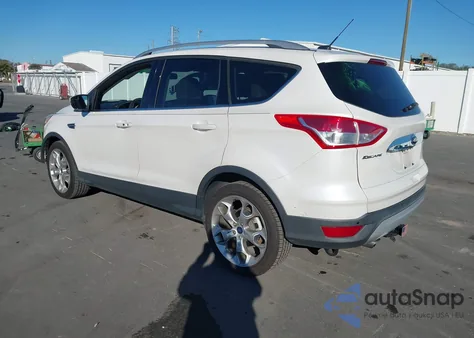 2014 Ford Escape Titanium z USA, uszkodzony, nr VIN 1FMCU0JX6EUC27833